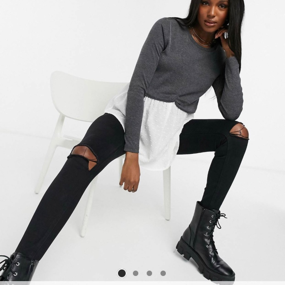 Maternity 2-1 sweater with undershirt. But can be worn while not pregnant